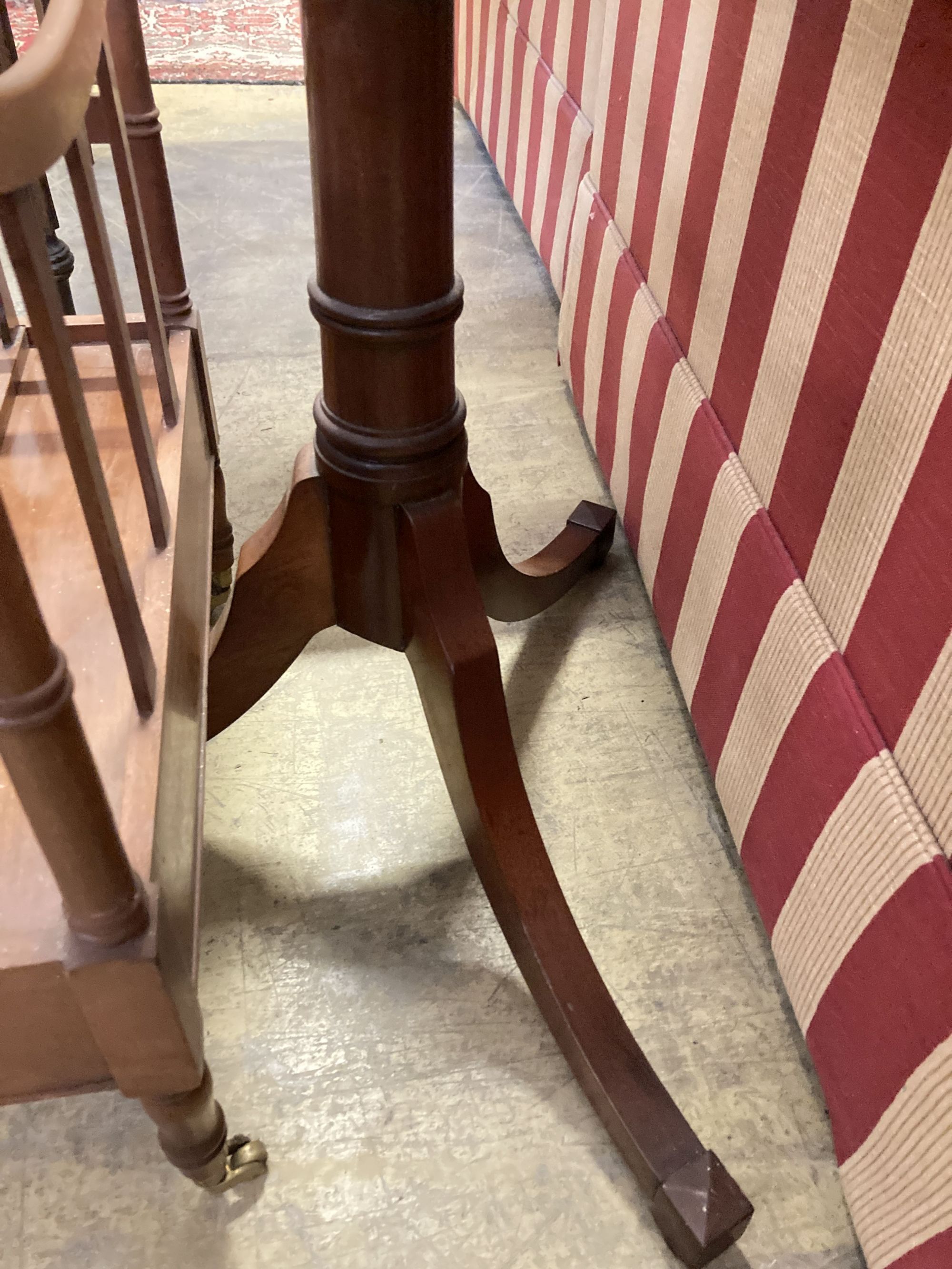 A reproduction Regency design mahogany duet music stand, width 52cm and music canterbury by Restall Brown and Clennell, Lewes